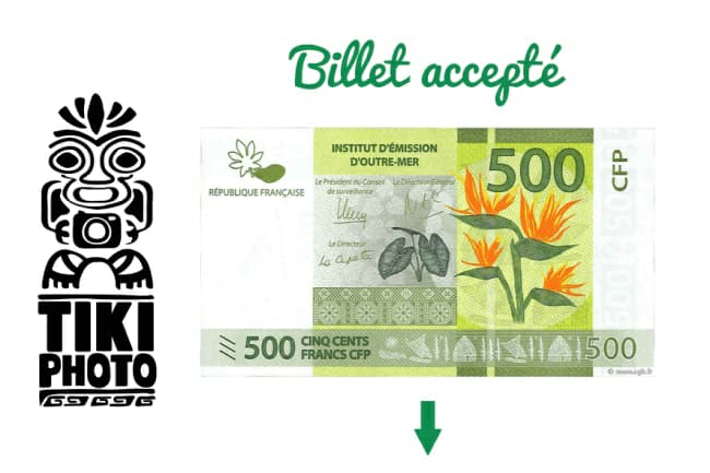 A picture of a 500 franc bill with an arrow pointing down.