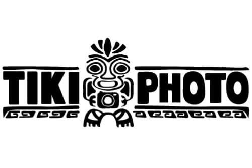 A black and white logo for tiki photo with a tiki on it.