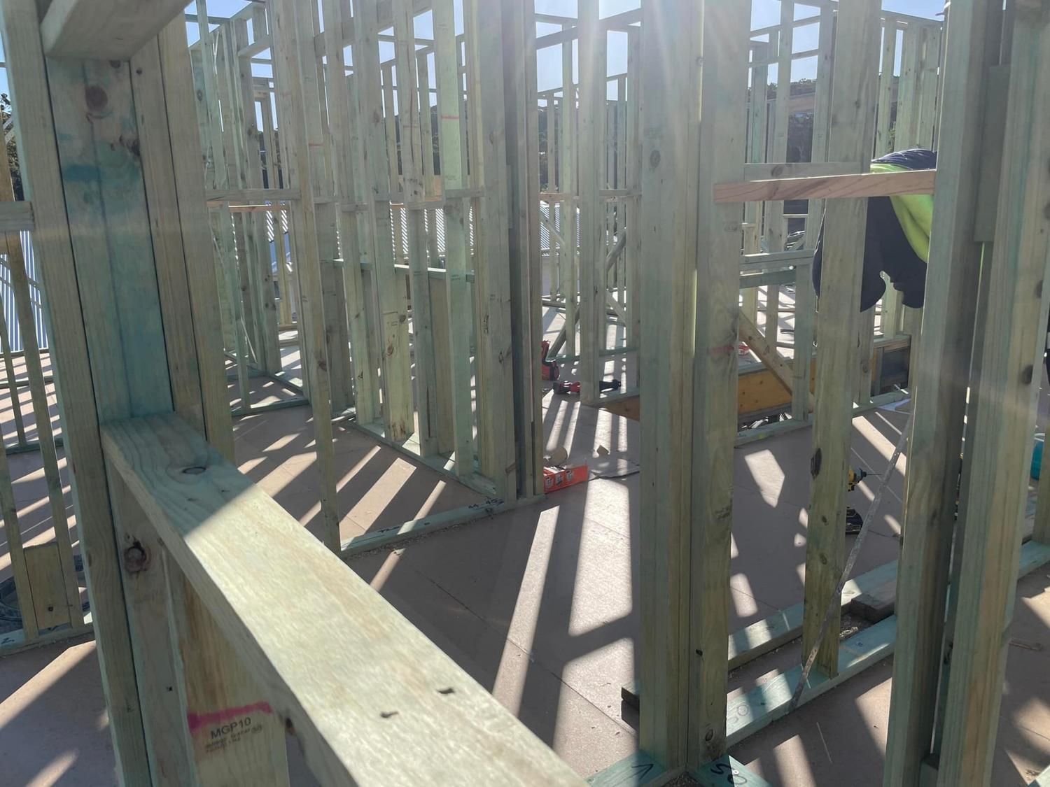 Wooden Framing of a Building Under Construction — McNamara's Frames & Trusses In Central Coast, NSW