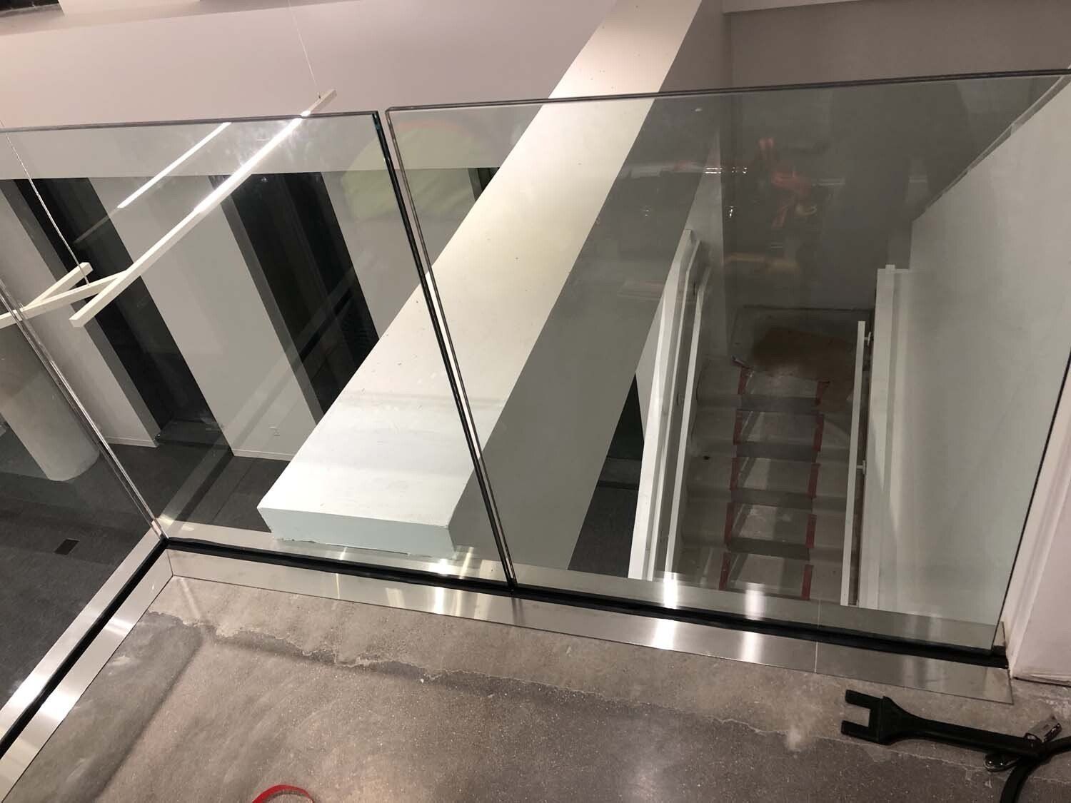 Glass balcony guardrail.