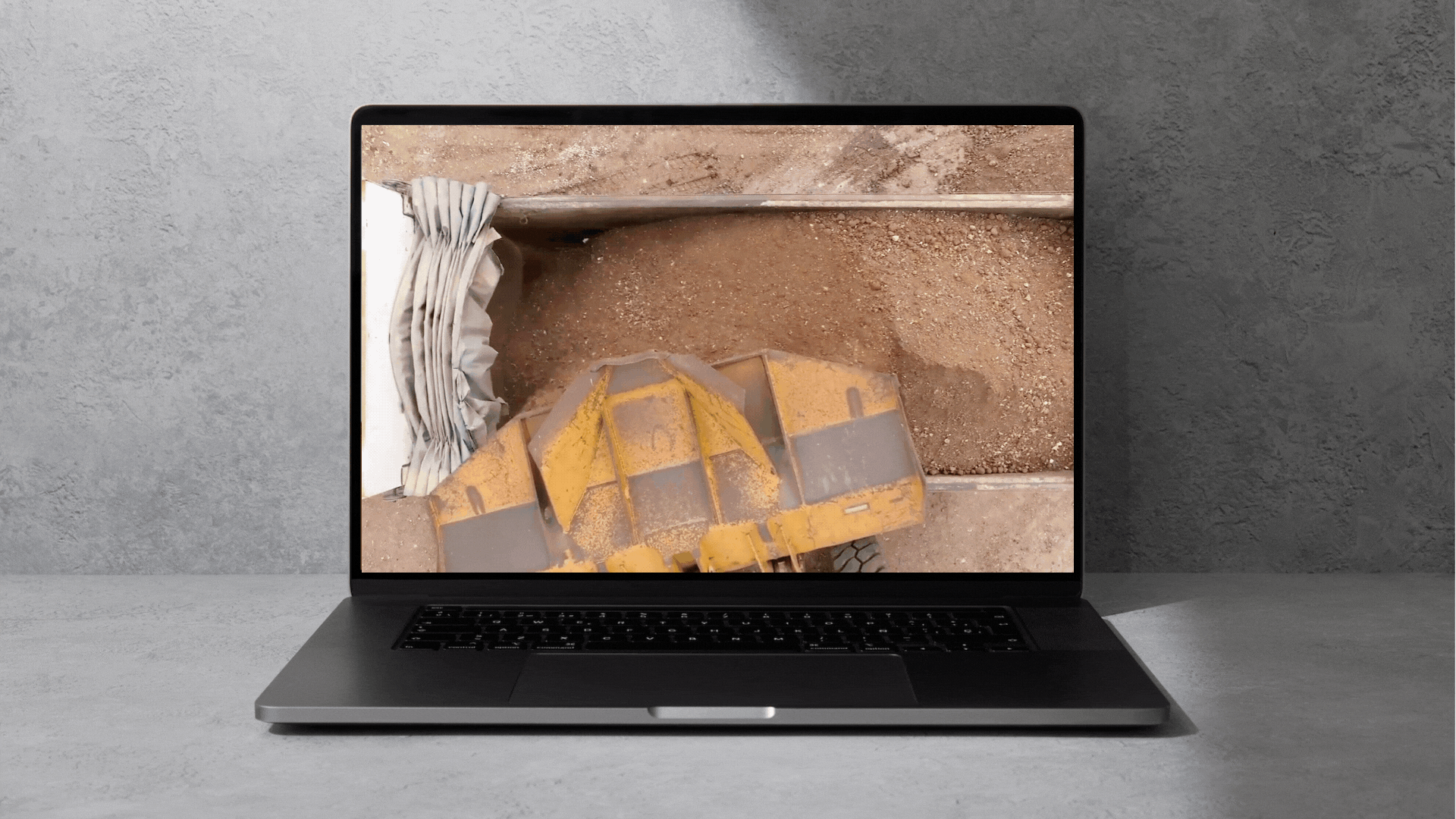 A computer monitor displays the logo for embrace in life care homes