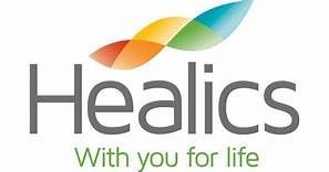 Healics logo with multicolor leaf shapes above gray text and green tagline “With you for life”