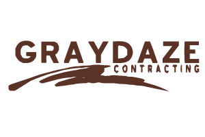 GrayDaze Contracting logo in brown and gray with stylized roofline design
