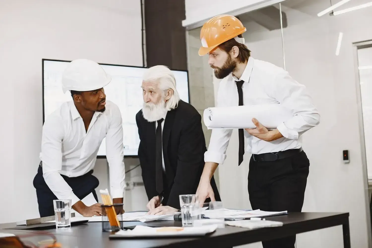 Advisors consulting at construction site