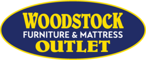 Woodstock Furniture & Mattress Outlet logo in yellow and white on a blue oval