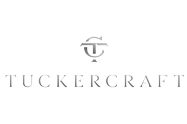 Tuckercraft logo in gray with a stylized “T” icon above the brand name.