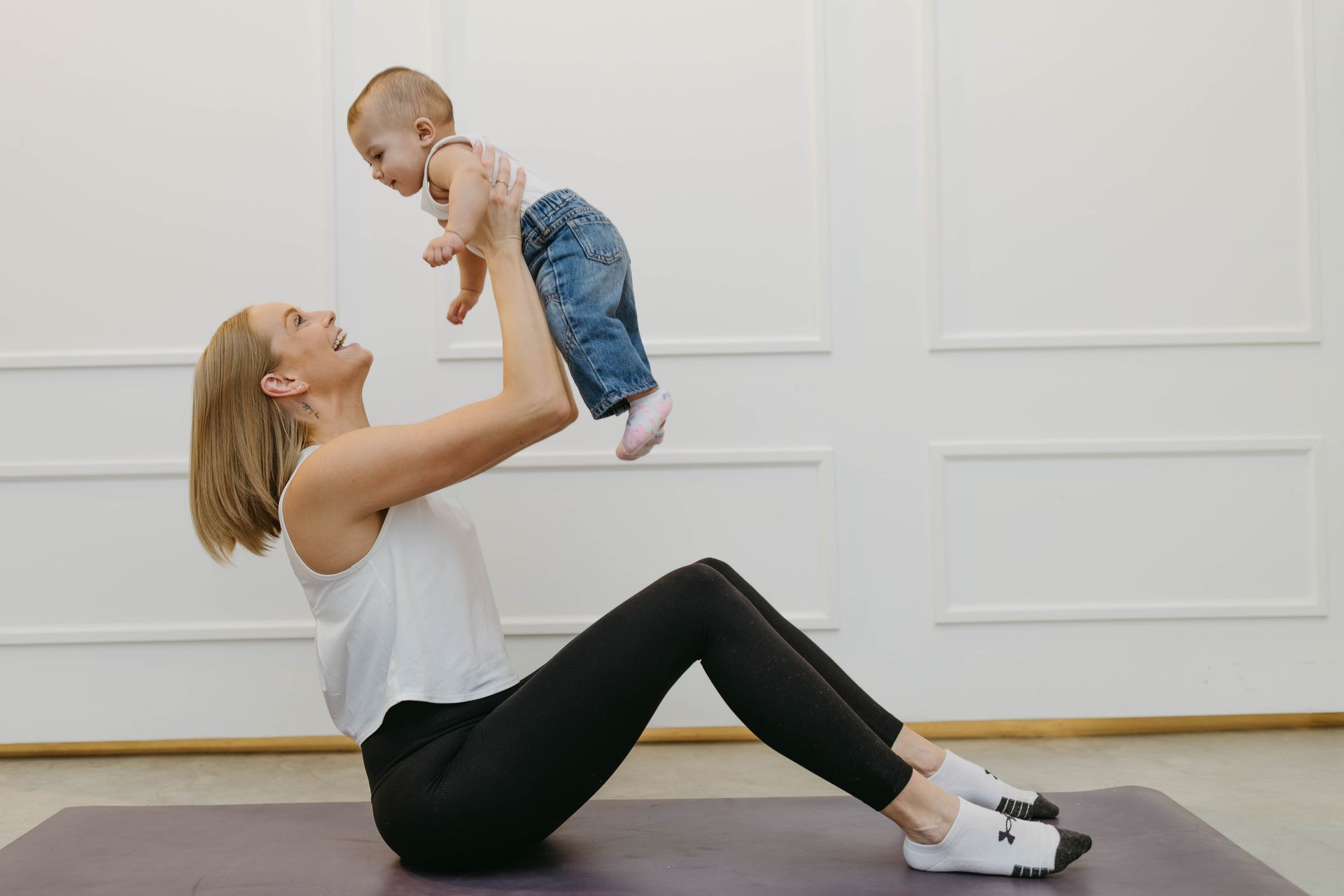 postpartum coach with baby