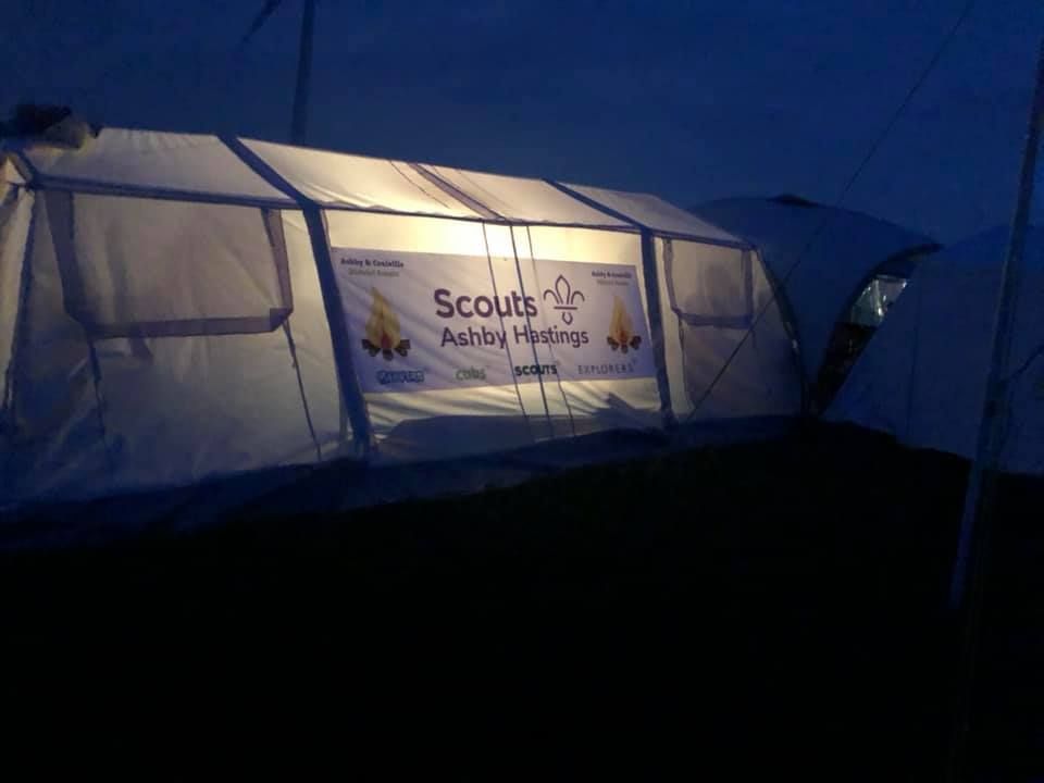 A tent with a sign that says scouts on it