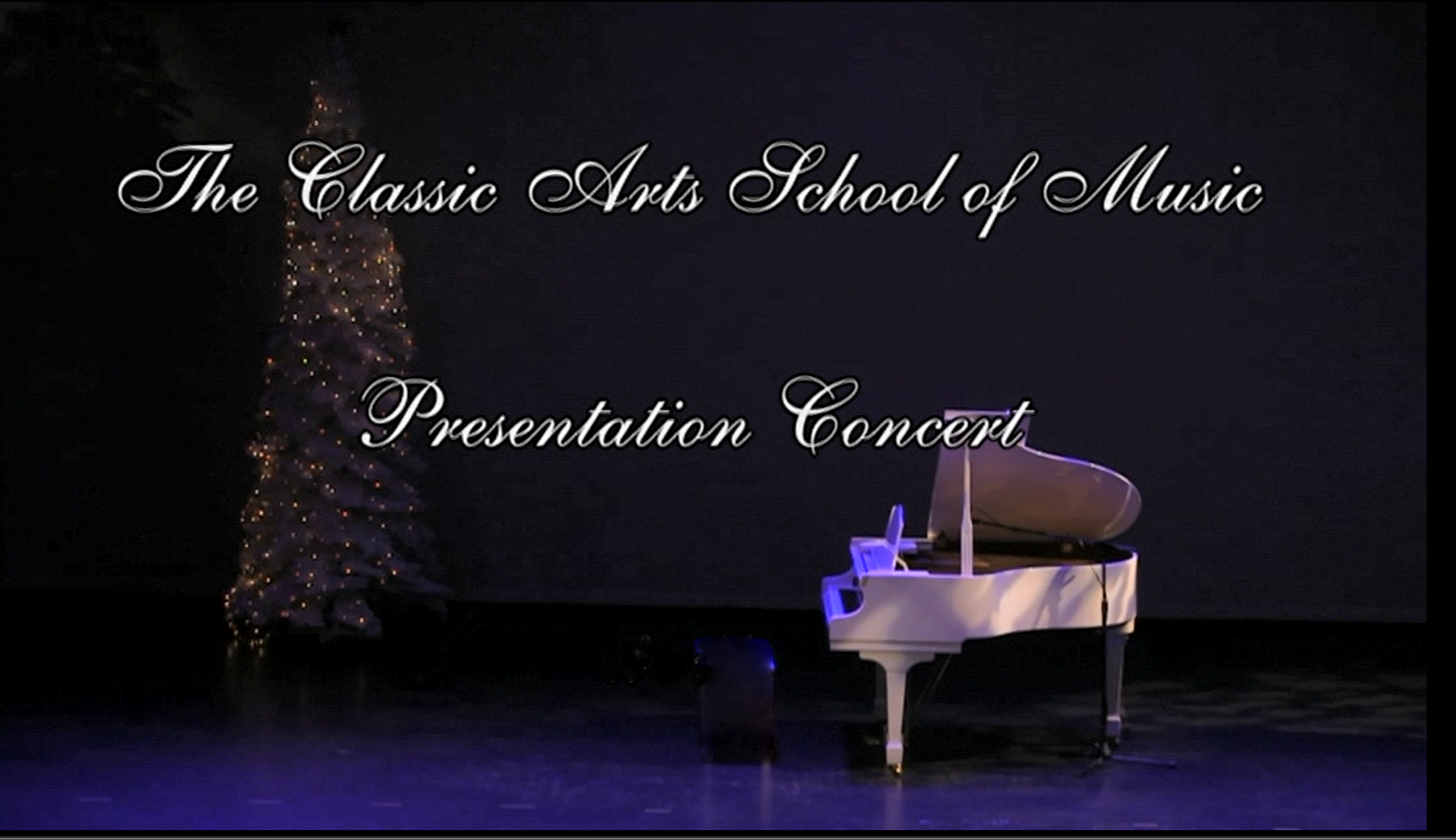 A white grand piano on a stage with