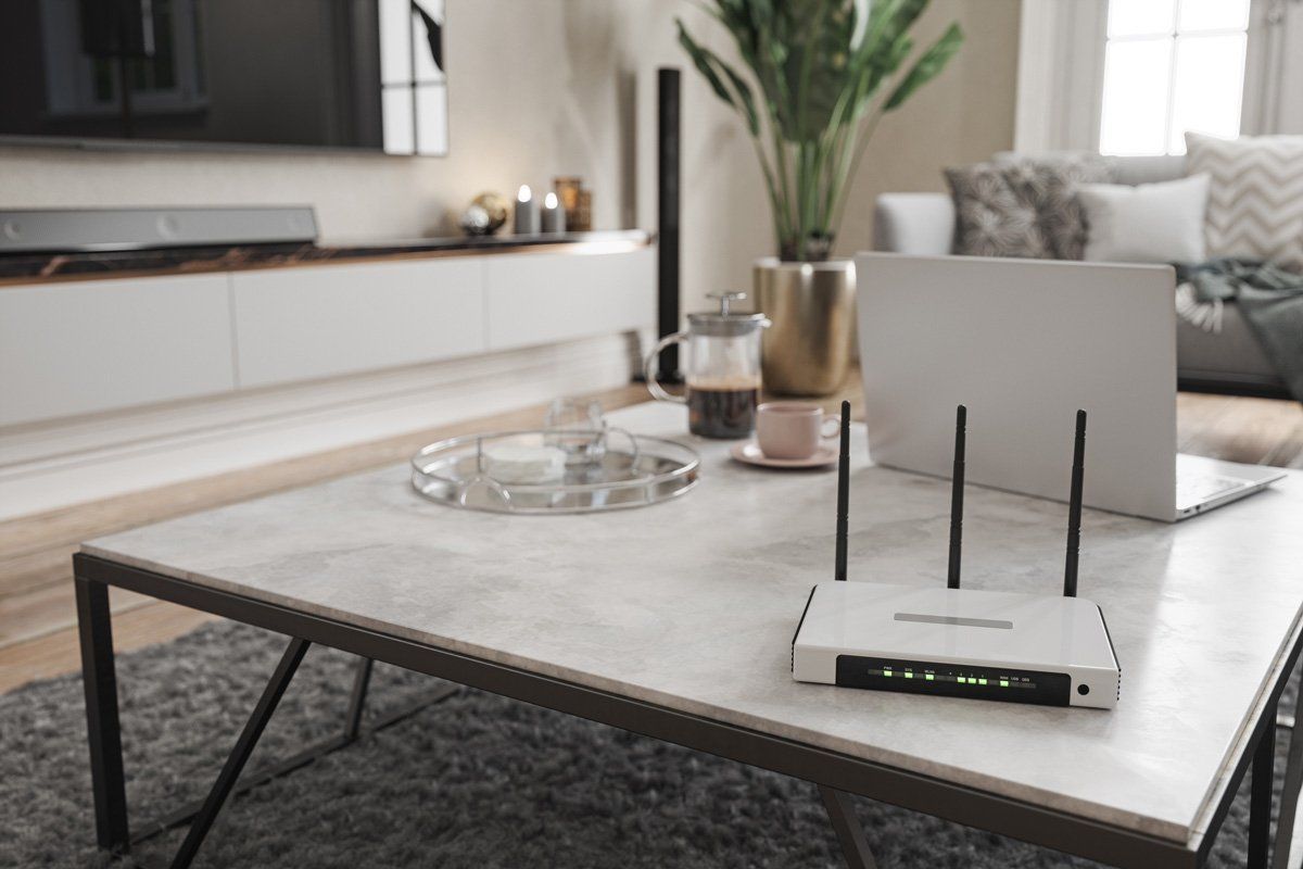 Internet Router and Laptop on the Table — Los Angeles, CA — The Phone Smith Internet Router and Laptop on the Table — Los Angeles, CA — The Phone Smith