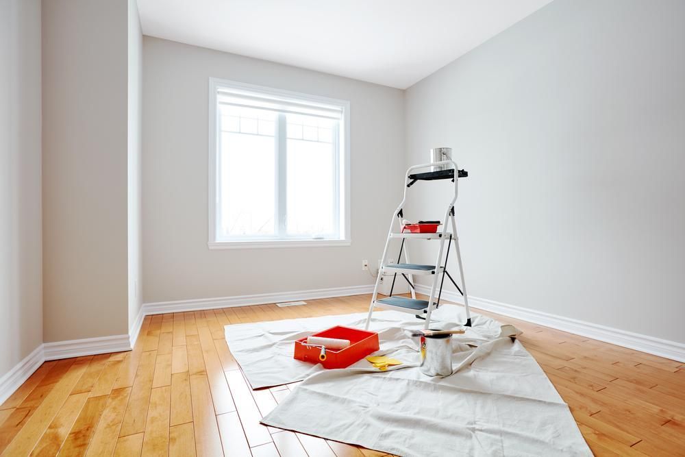 Empty Room With a Ladder and Paint Supplies on the Floor — Capital Ultimate Facility in Beard, ACT