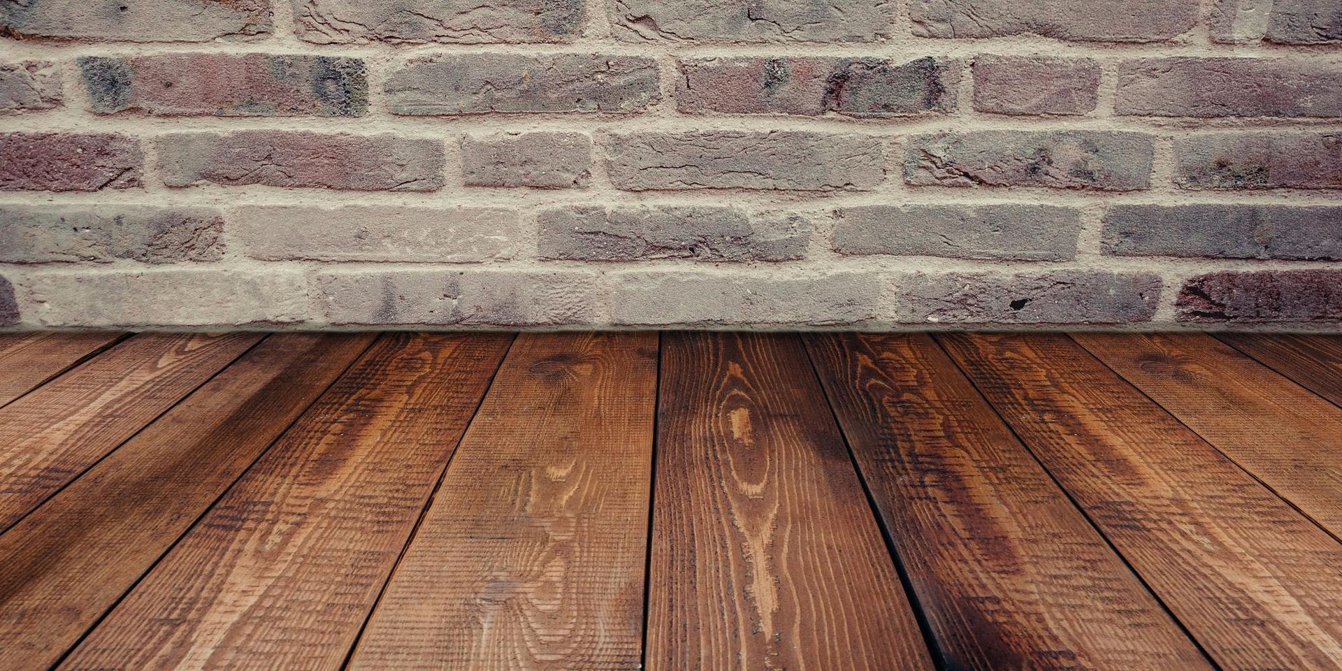 Close Up of a Wooden Floor With Peeling Paint — Capital Ultimate Facility in Beard, ACT
