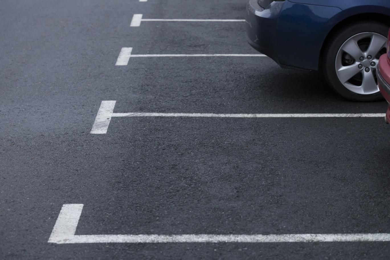 Blue Car is Parked in a Parking Lot Next to a Red Car — Capital Ultimate Facility in Beard, ACT
