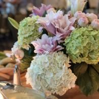 Soft pastel bouquet of hydrangeas and lilies in a decorative arrangement