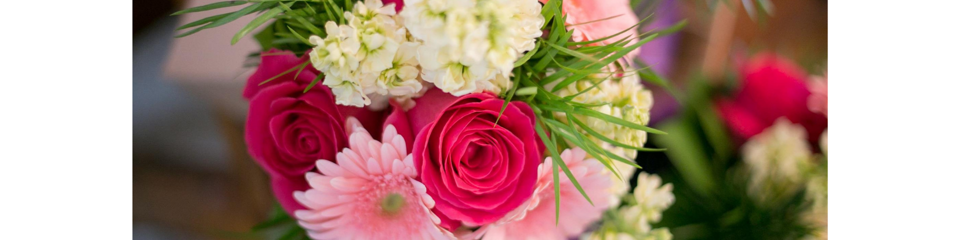 Pink and white bouquet of roses and hydrangeas with green leaves