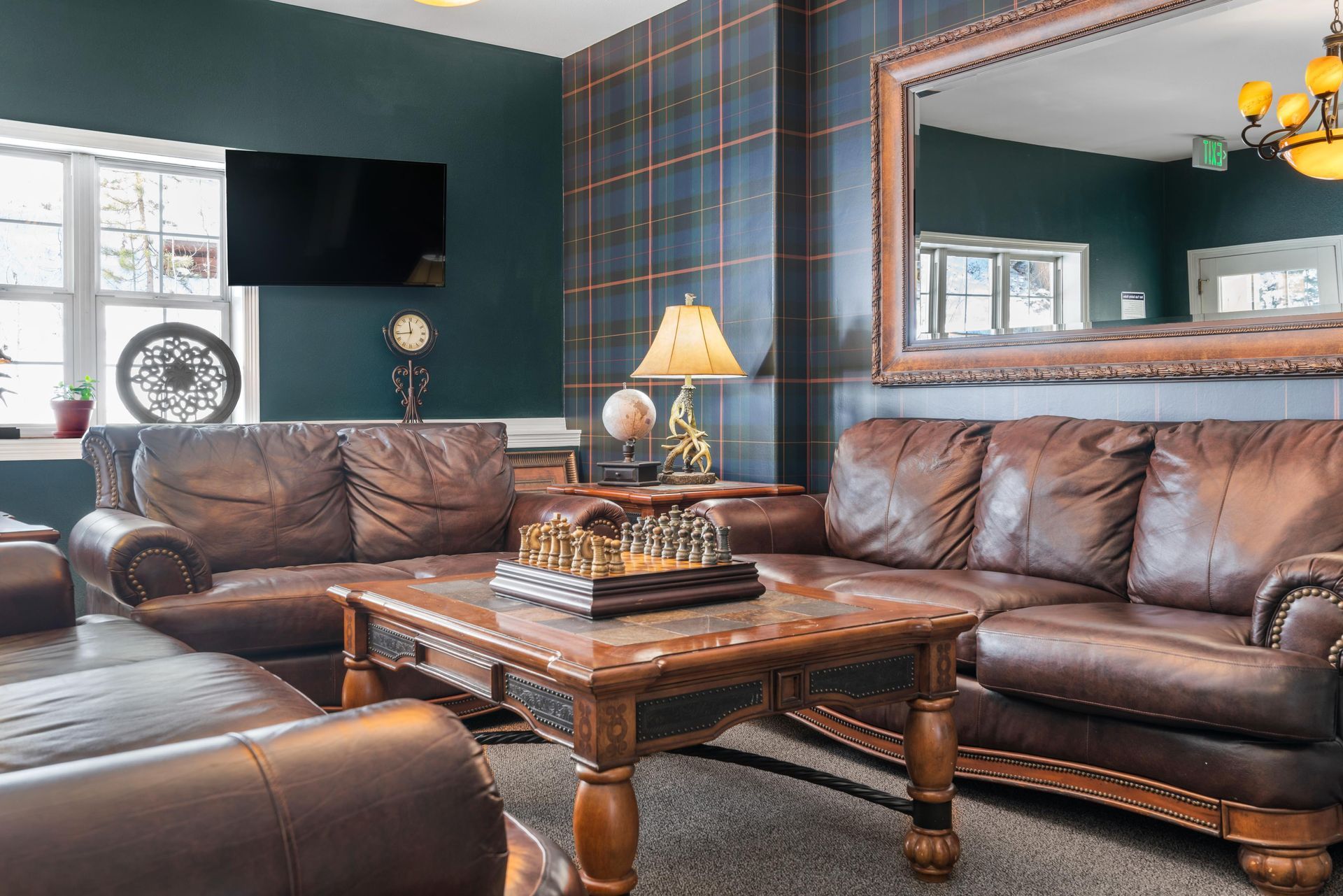 There is a chess board on the table in the living room.