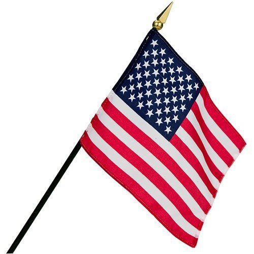 American flag on a black stick with a gold spearhead. The flag is red, white, and blue.