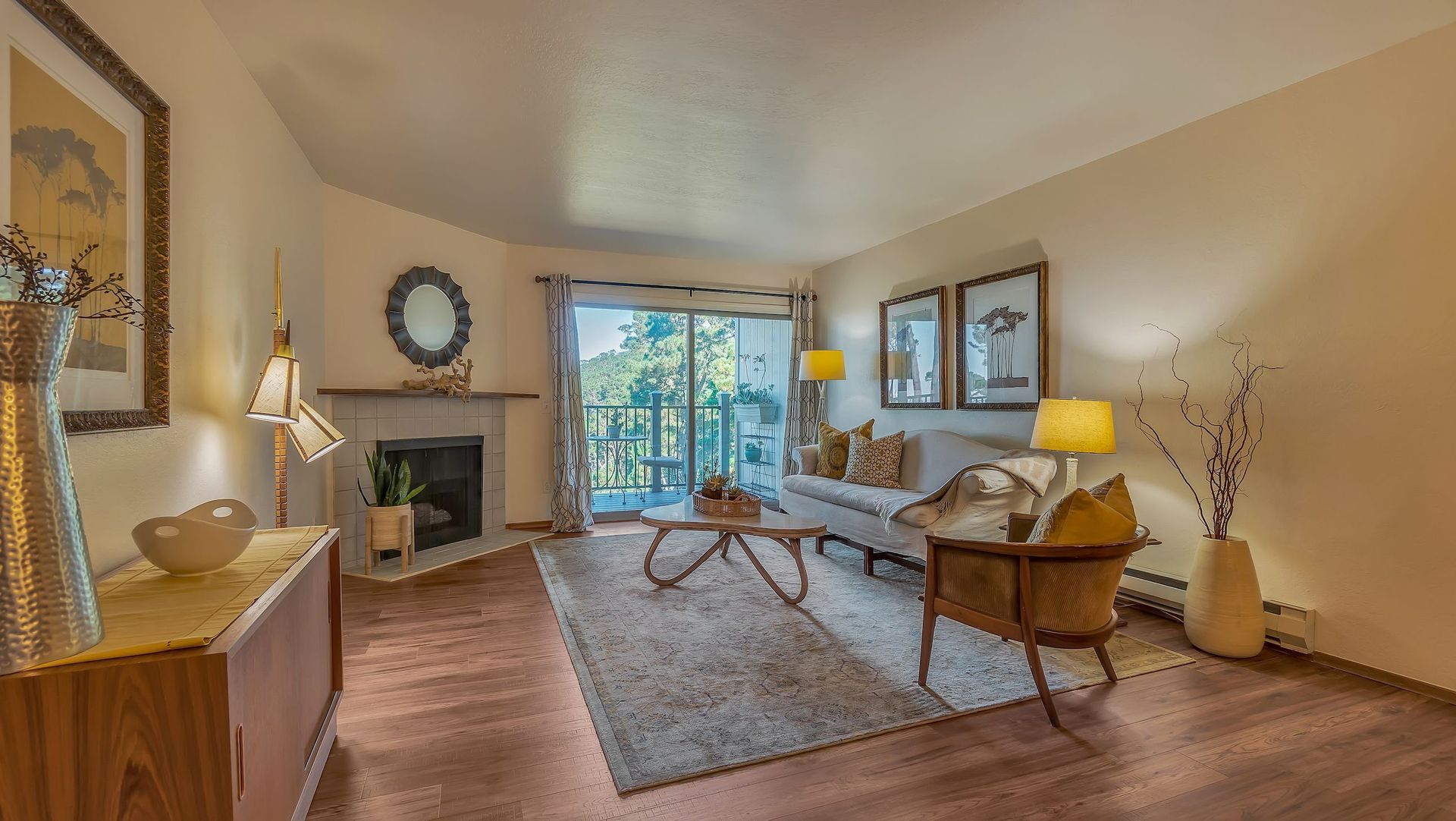 Tanglewood Condos in Monterey, California interior view. Condominium interiors may vary but this shows the general size and view from the living room with a walkout to the balcony.