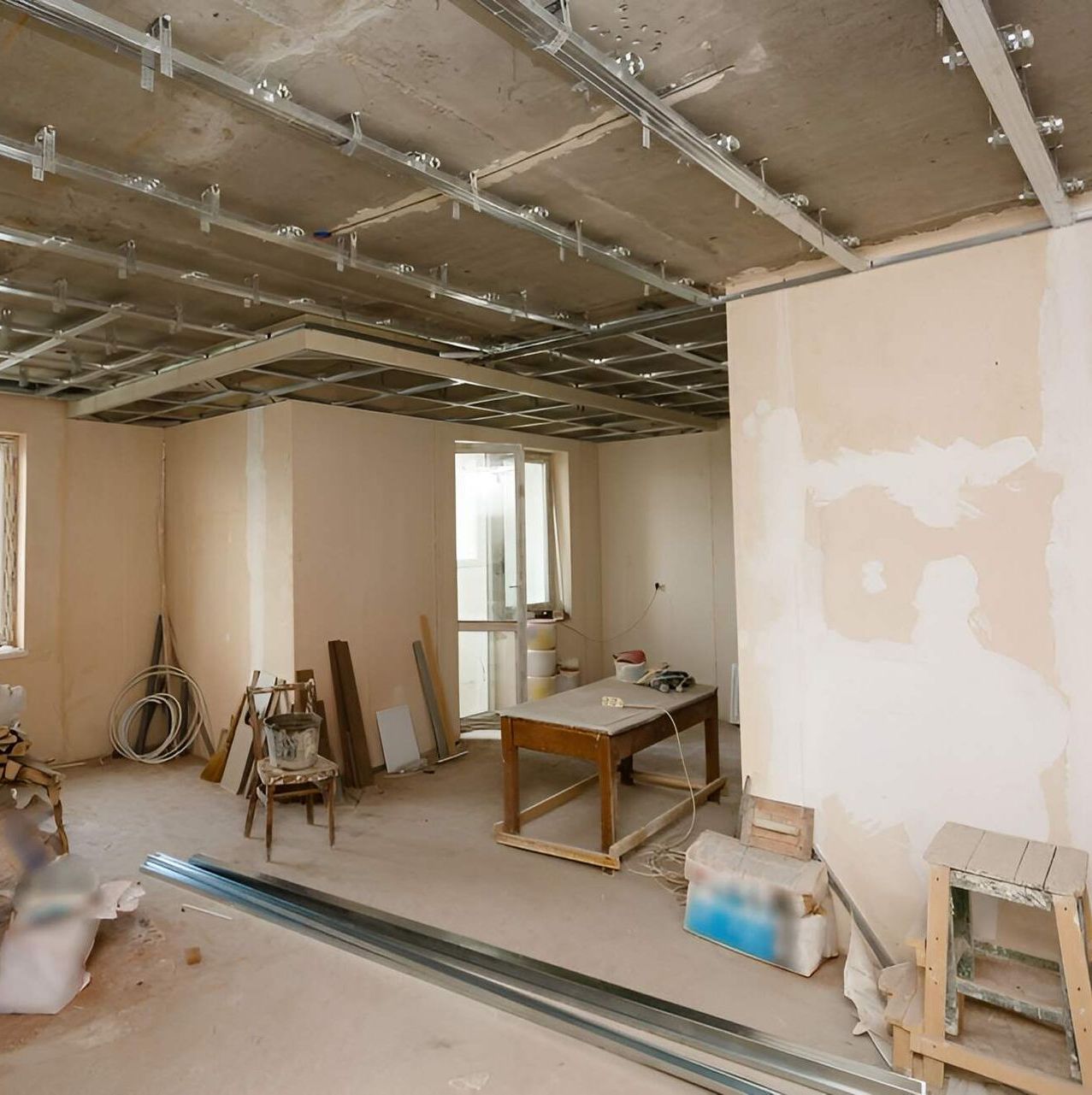 A Room That Is Being Remodelled With A Table And Chairs In It — Affordable Underpinning Solutions In Nowra, NSW