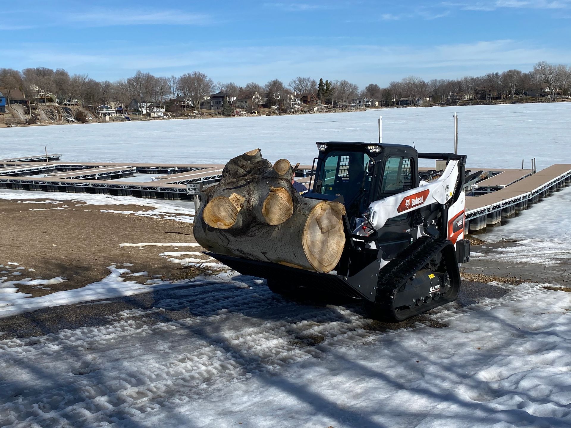 Great Outdoors barge crew on Minnesota lake with dock materials