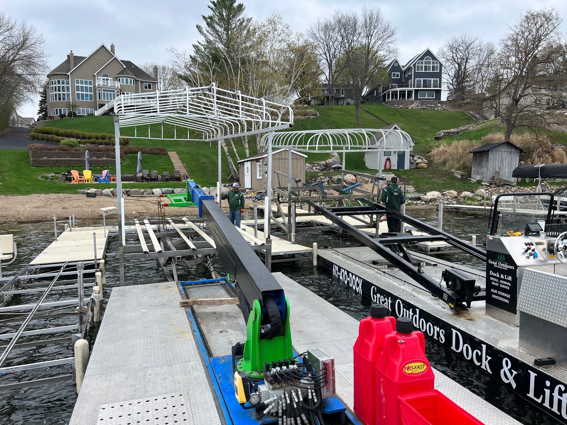 Great Outdoors barge crew on Minnesota lake with dock materials
