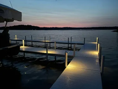 Outdoor lighting at a Minnesota lakefront dock at dusk