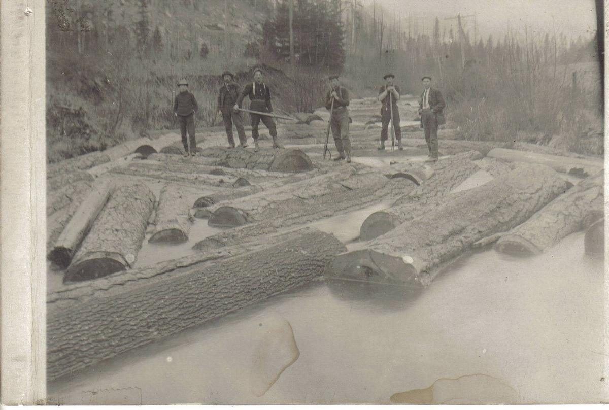 Historical photograph of a log drive on the Kootenai River, from the Boundary County Museum collection
