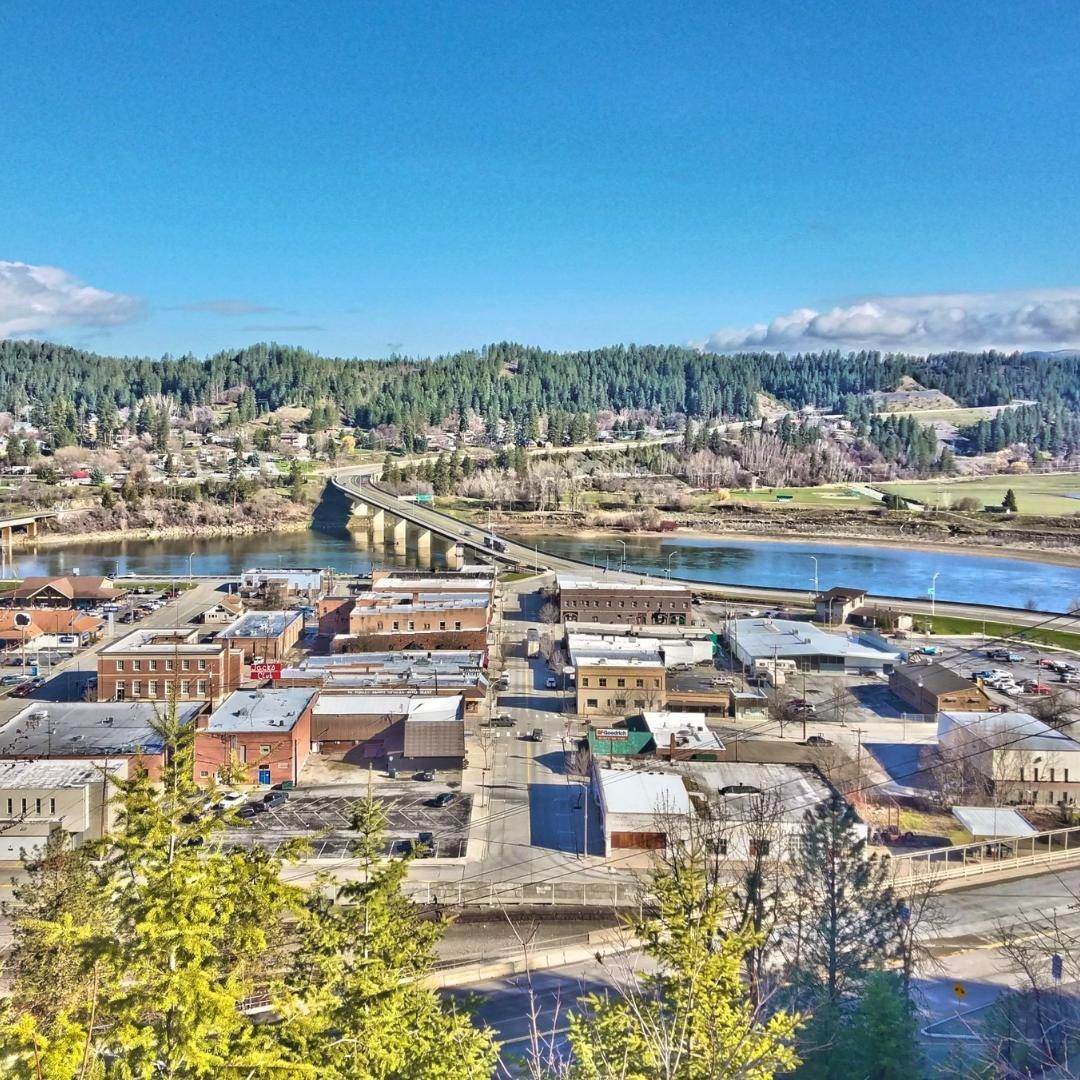 Aerial view of downtown Bonners Ferry, Idaho, with the Kootenai River and bridge