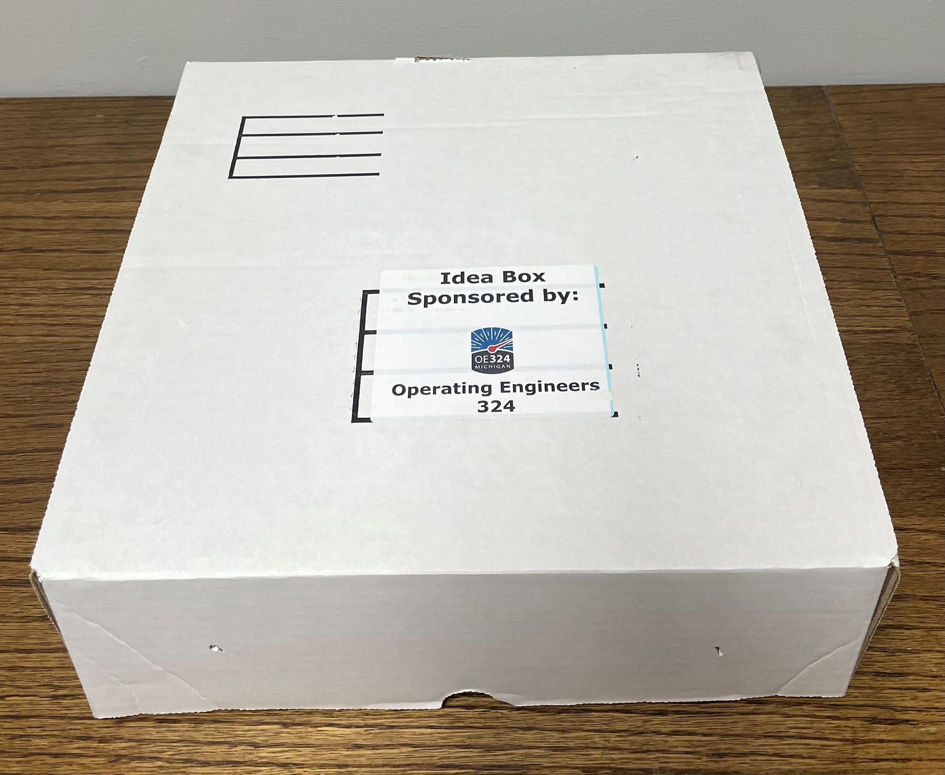 A white box with a sticker that says operating engineers on it