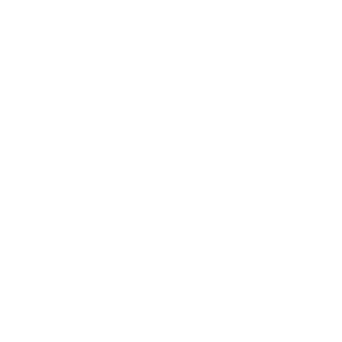 two men are standing next to each other in a garage looking under the hood of a car