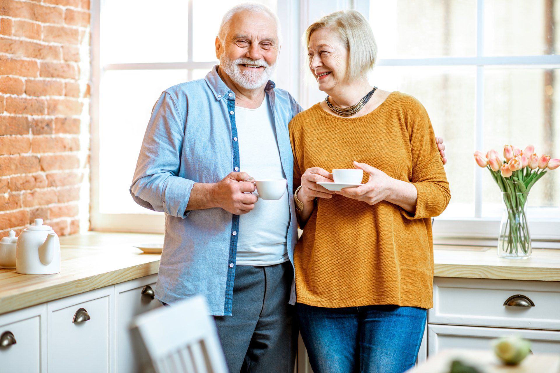 elderly couple in kitchen
