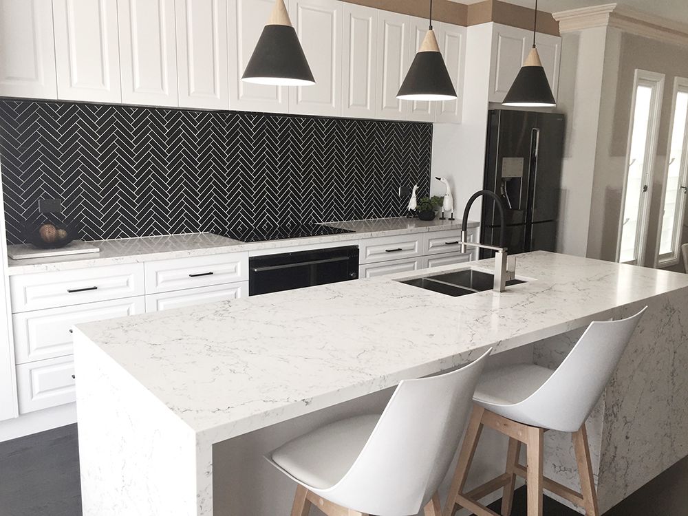 Modern White Kitchen With Black Herringbone Backsplash, Island — Affordable Tiles and Pavers In Morisset, NSW