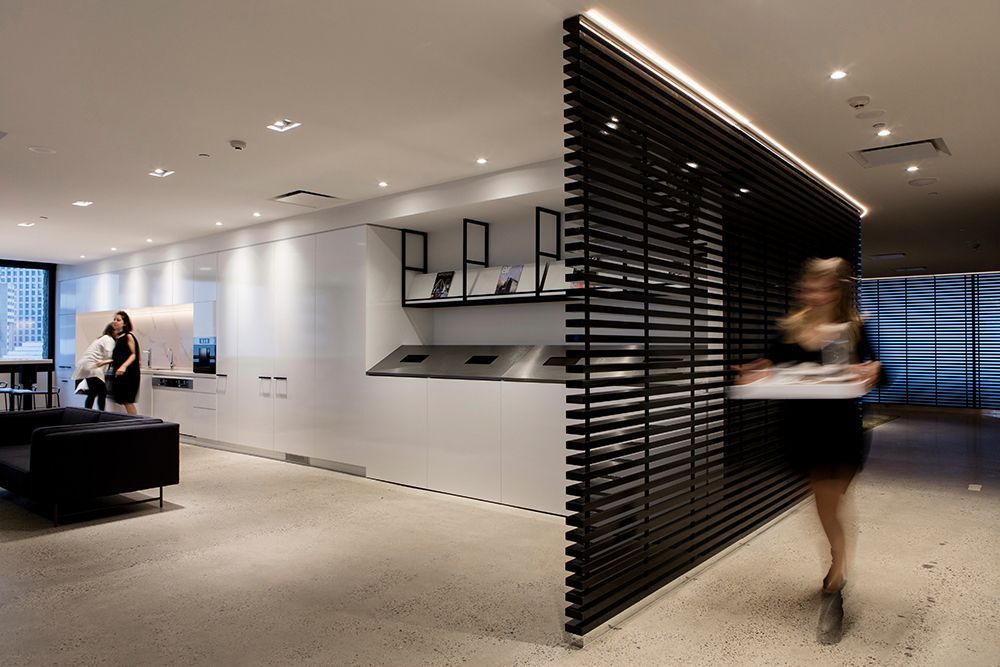 Modern Office Interior With White Walls, and Black Divider — Affordable Tiles and Pavers In Morisset, NSW