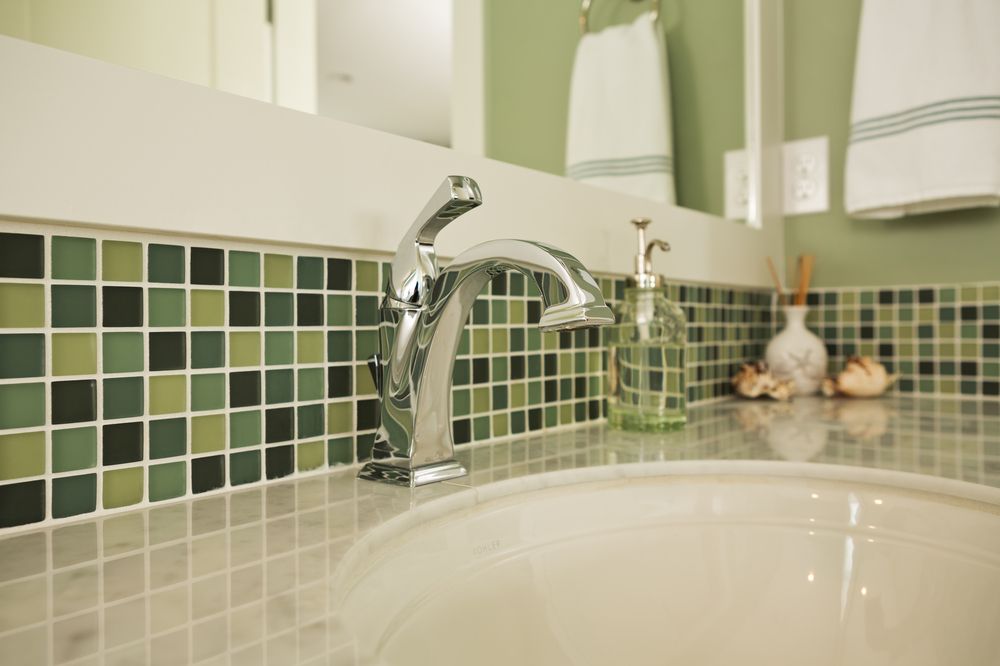 Close-up of Bathroom Sink With Chrome Faucet, Green and White Tile — Affordable Tiles and Pavers In Morisset, NSW