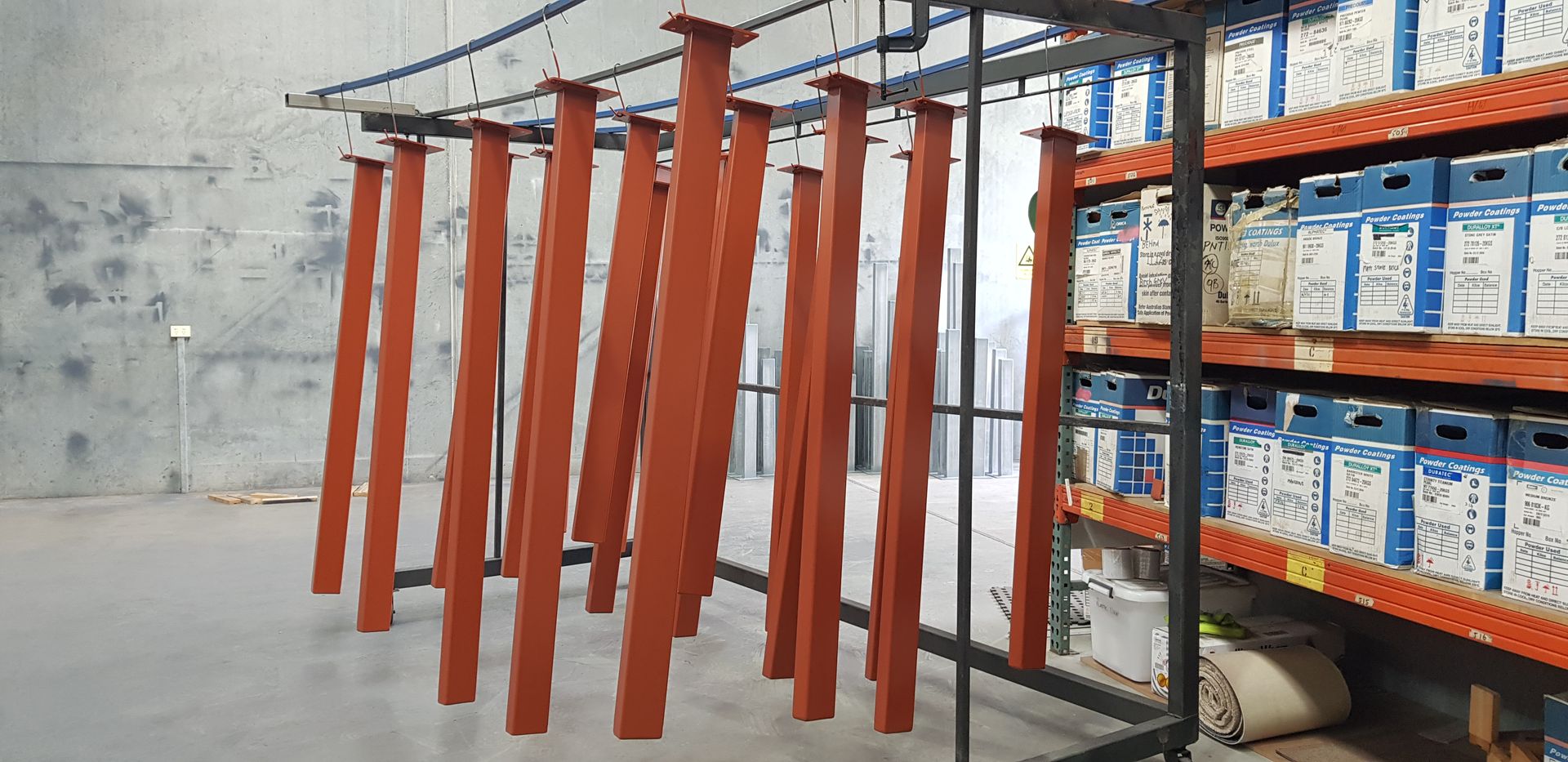 A warehouse filled with lots of shelves and boxes of paint.