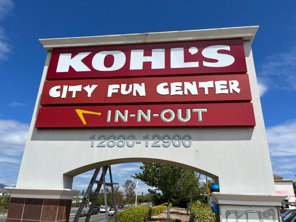 A kohl 's city fun center in-n-out sign