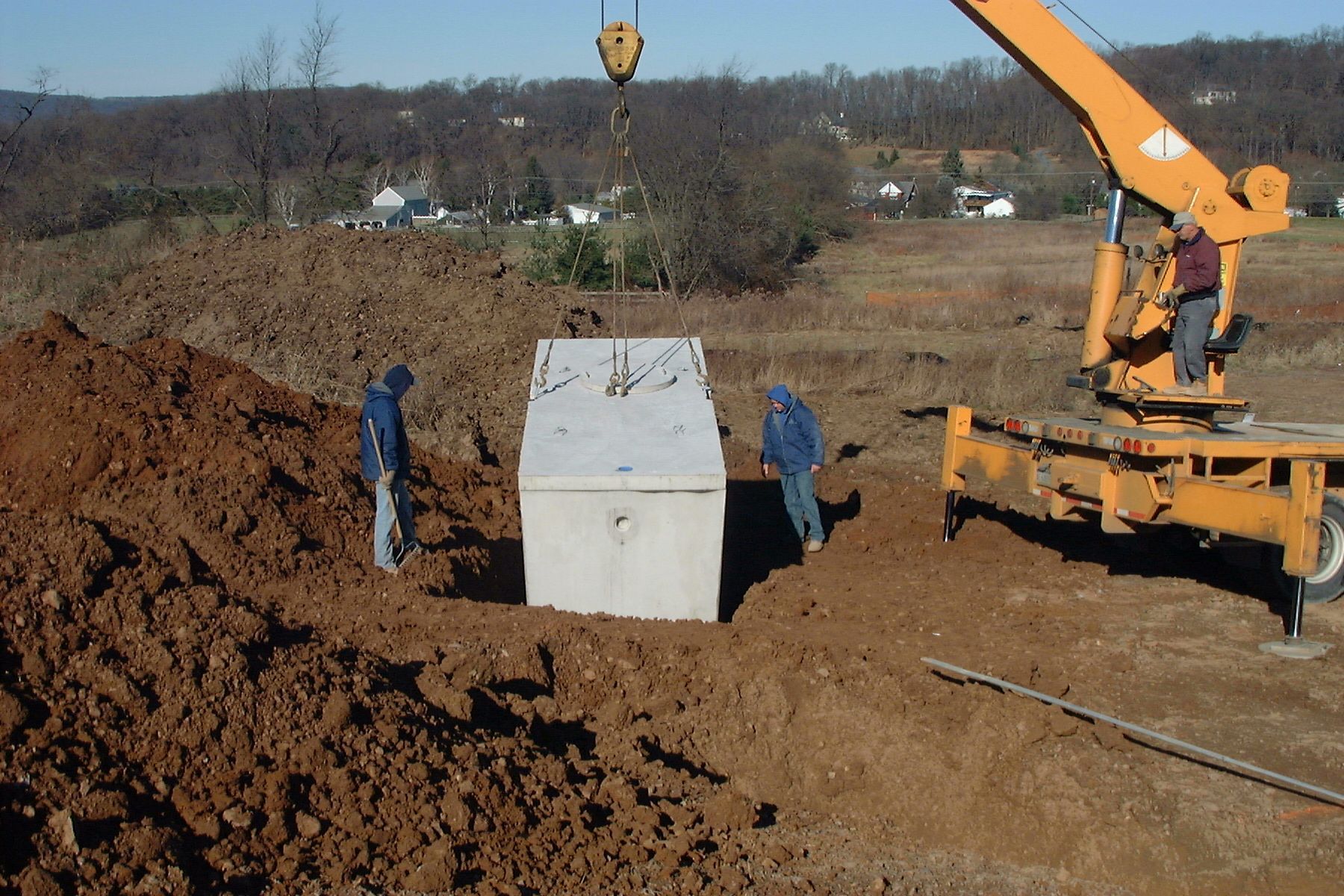 Septic tank installation project using excavation equipment in Eastern Pennsylvania