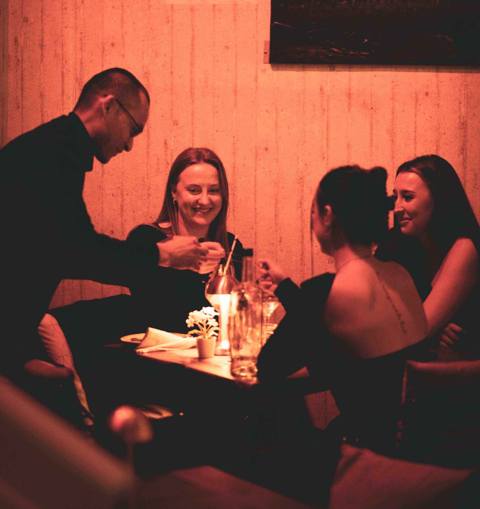 Close up magician entertaining guests at Adelaide private party