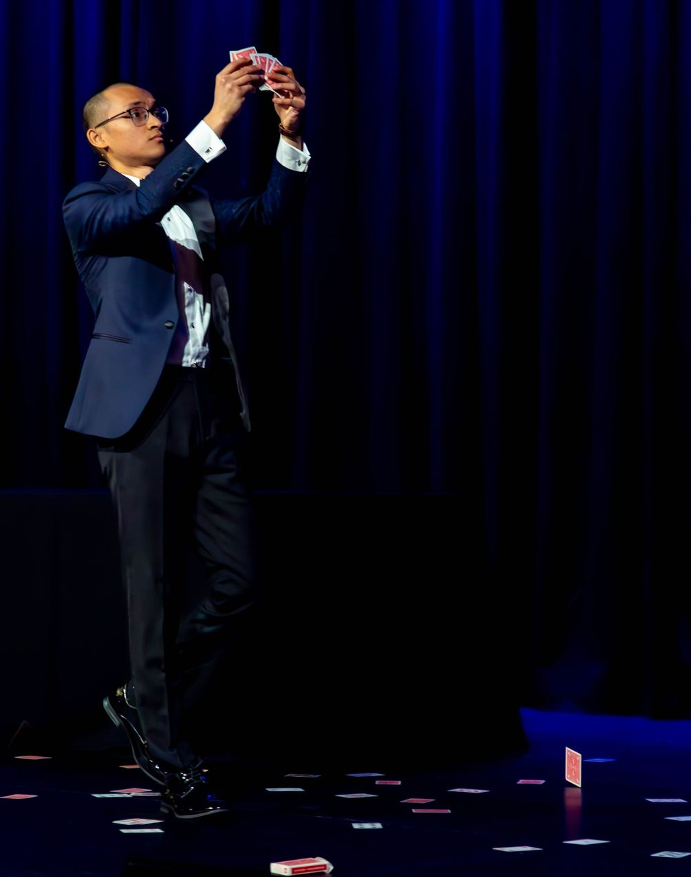 Corporate magician Adelaide performing stage magic at a conference event