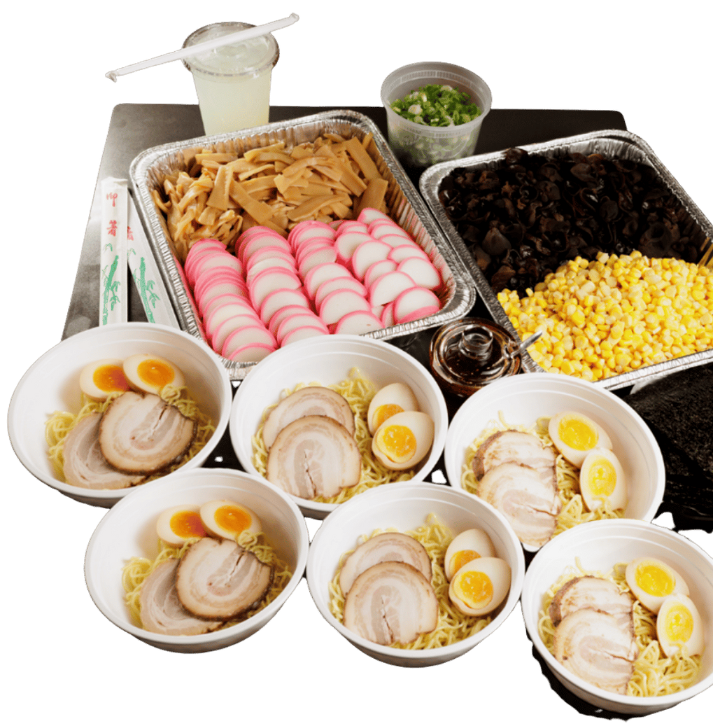 Bowls of ramen with soft-boiled eggs, sliced pork, and side dishes
