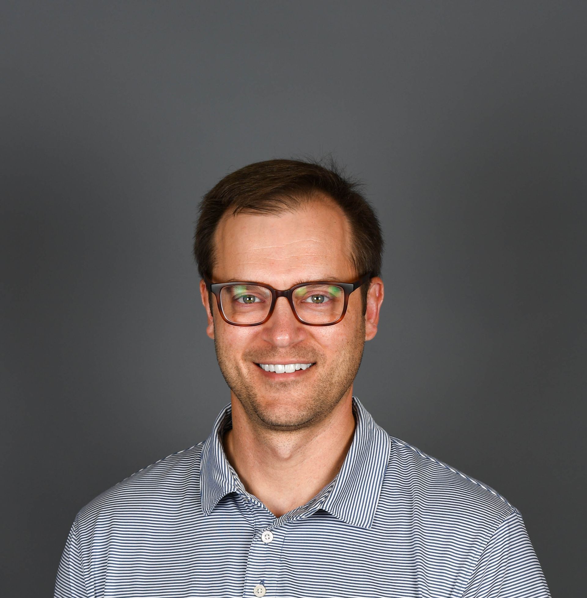 Headshot of Adam Sheridan