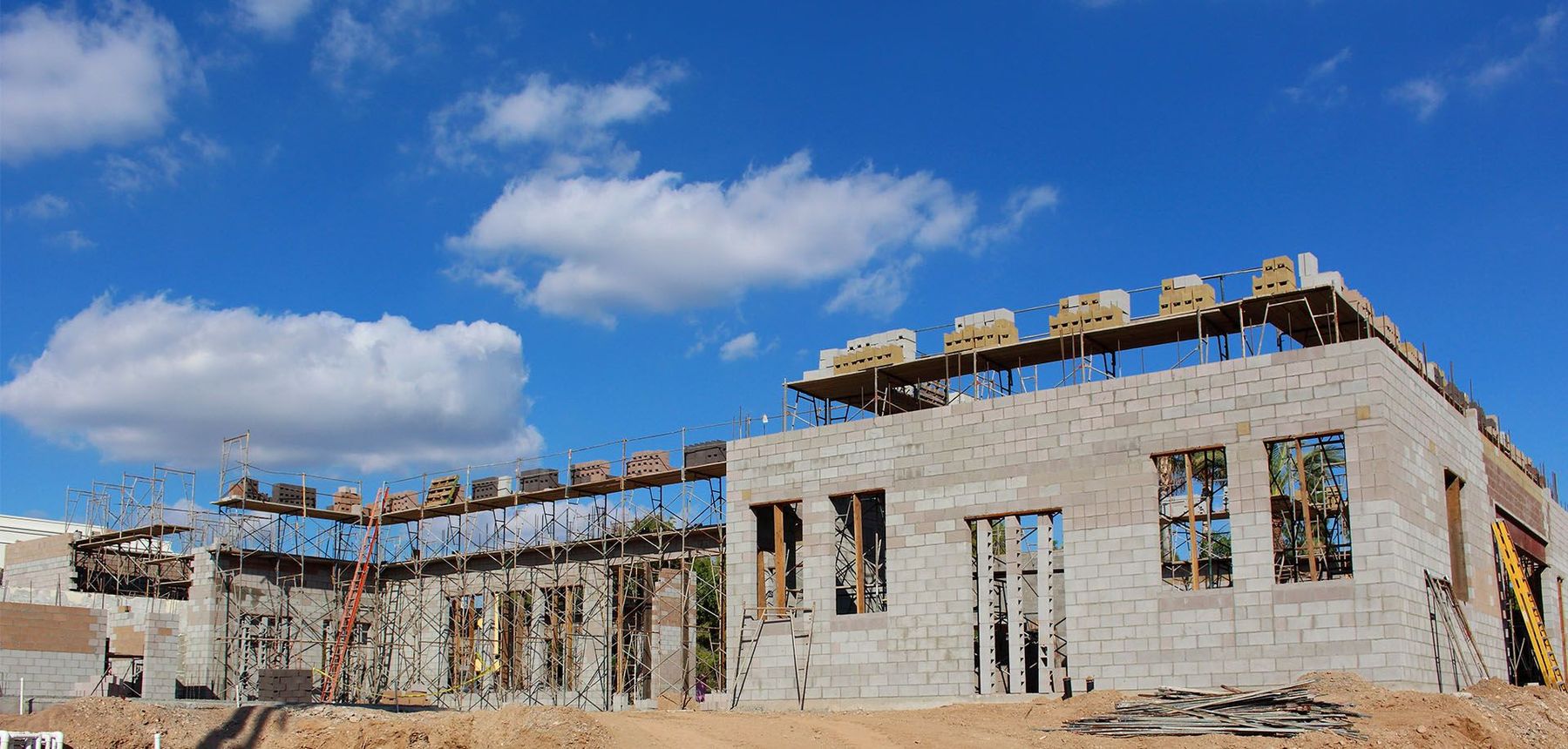 a building under construction with scaffoldings