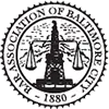 The seal of baltimore city is a black and white seal with a scale of justice in the center.