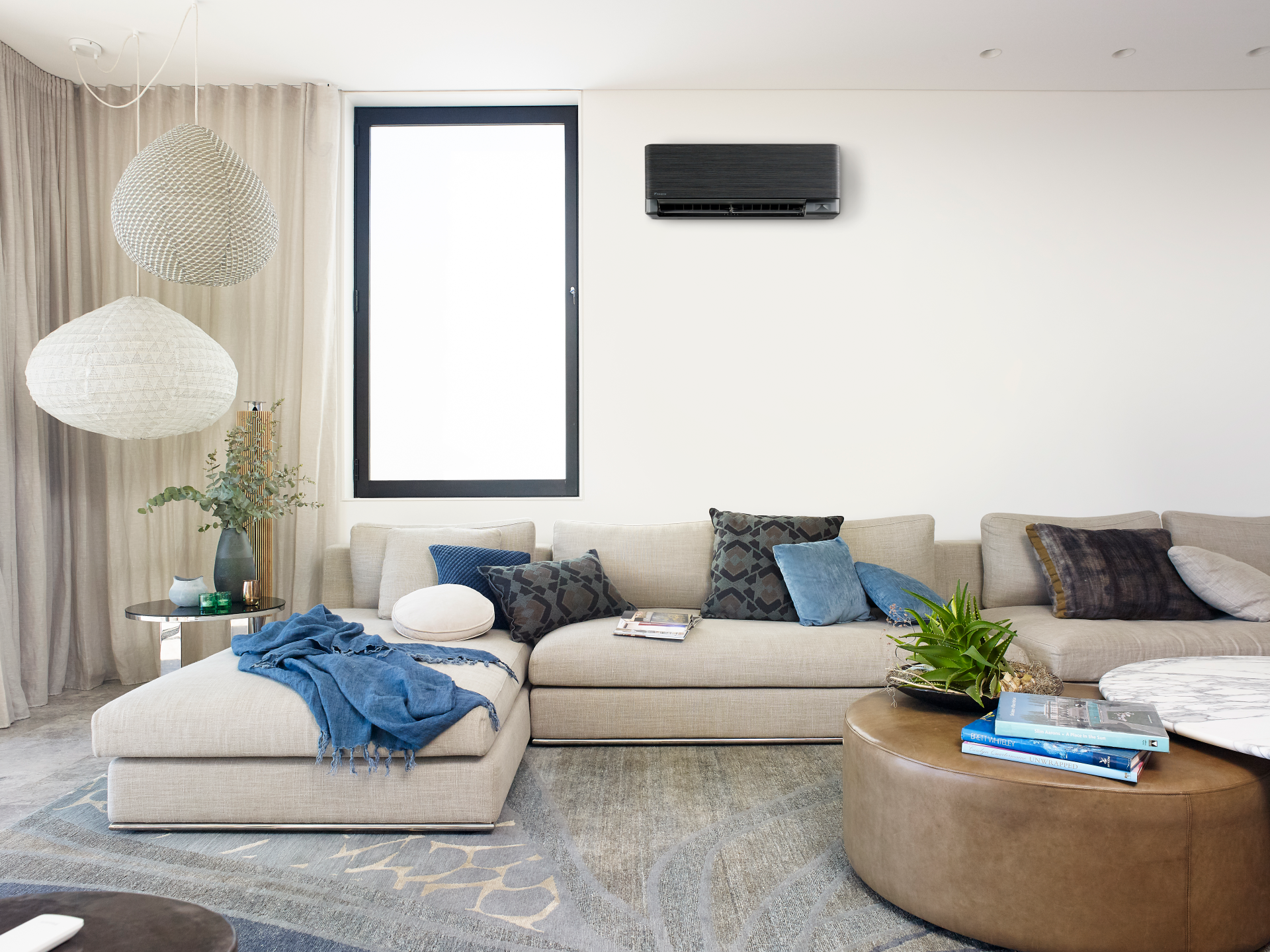A Bedroom With A Large Bed And A Wooden Wall — L & K Electrical & Air Conditioning in Tamworth, NSW