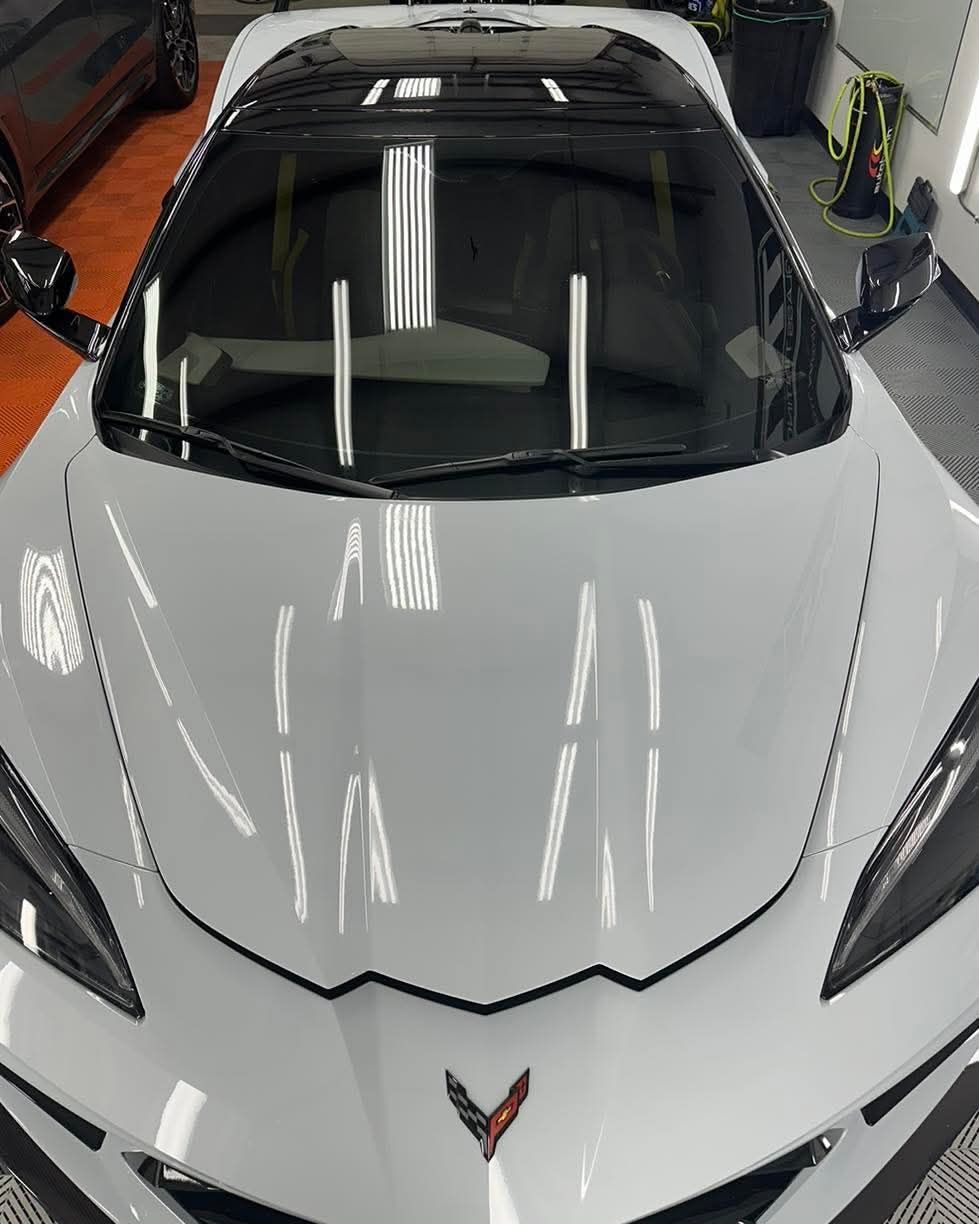 A white corvette sports car on a white background.