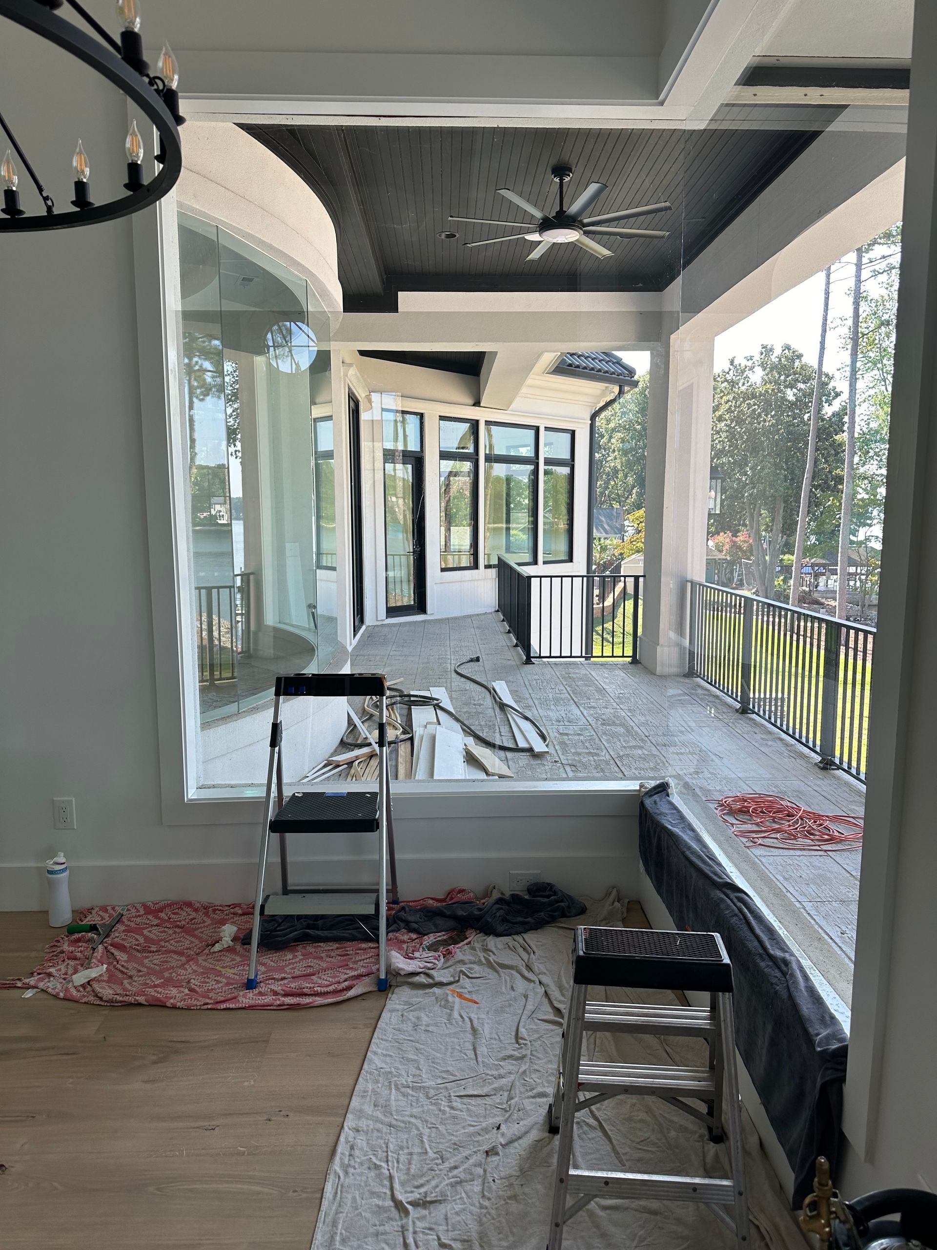 A porch is being painted in a house.