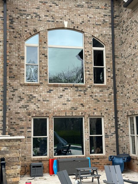 A large brick building with a lot of windows