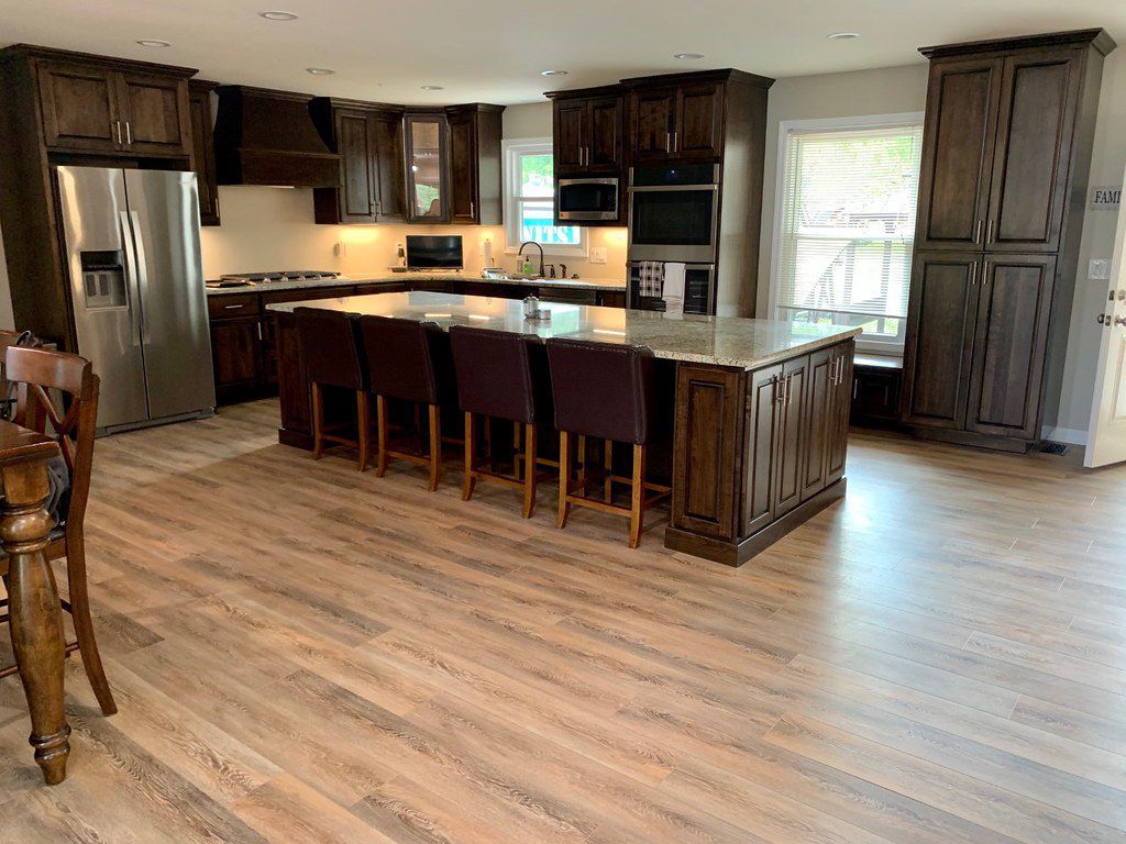 There is a large island in the middle of the kitchen