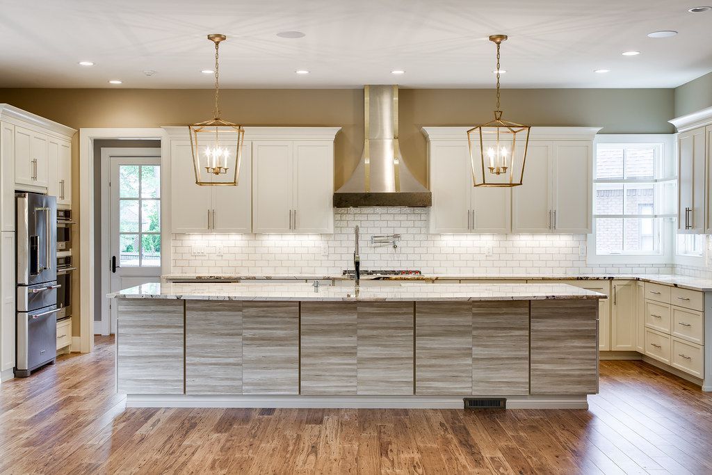 There is a large island in the middle of the kitchen