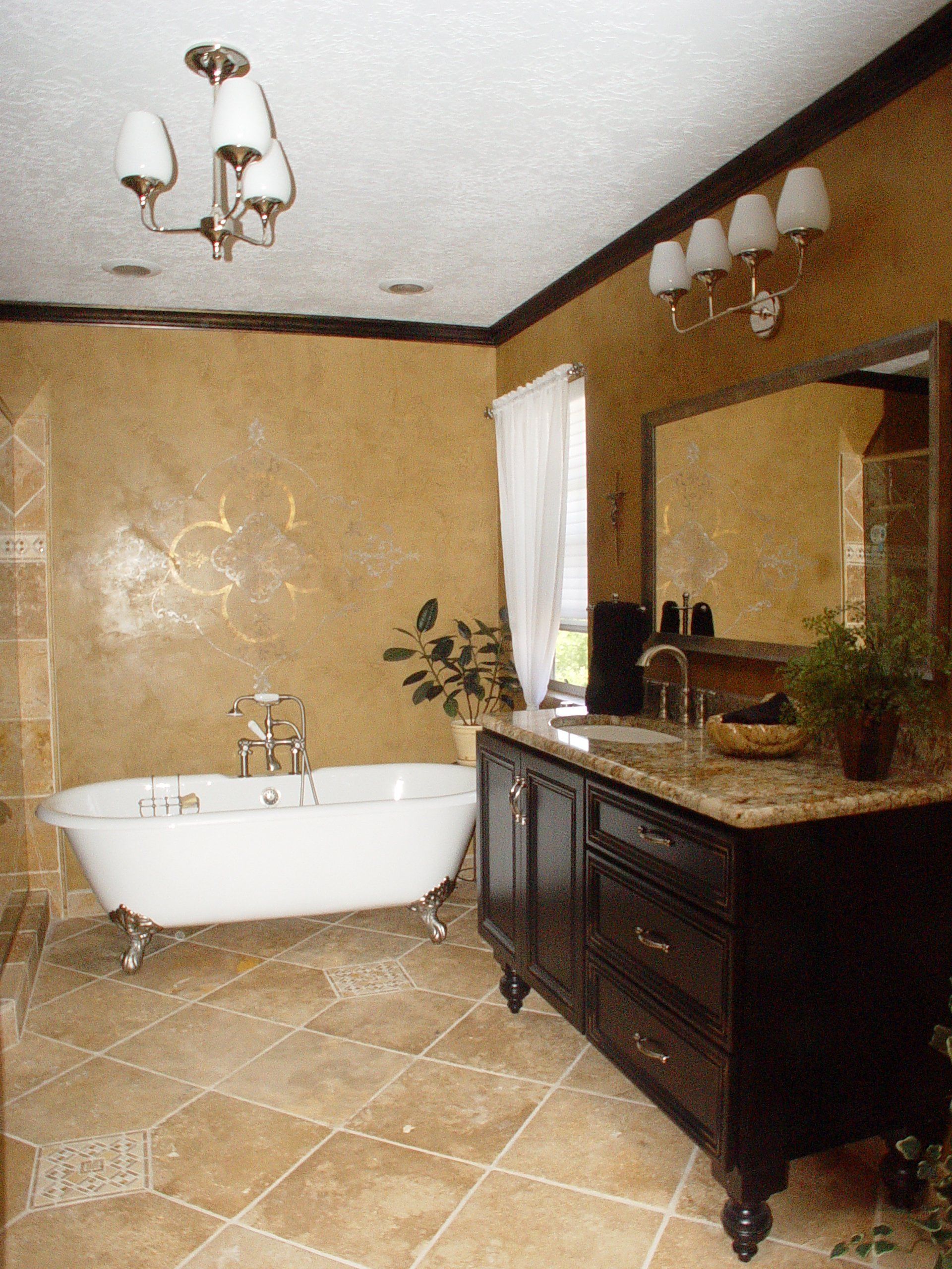 A bathroom with a bathtub a sink and a mirror